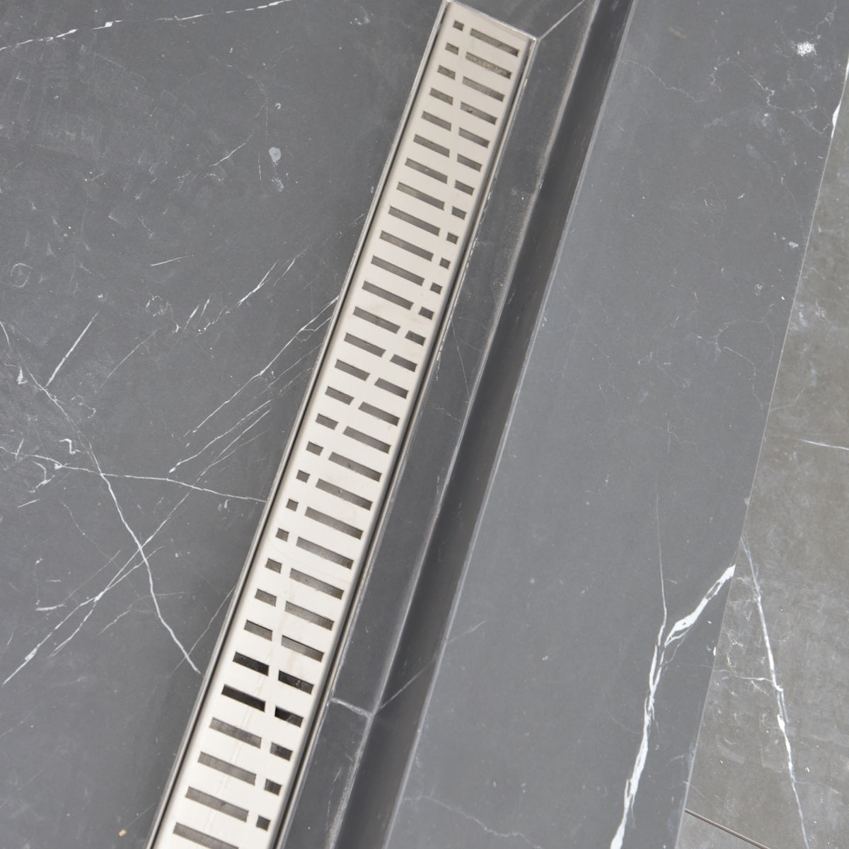 16" Linear Shower Drain, Brushed Stainless Steel, Wind Design – SereneDrains
