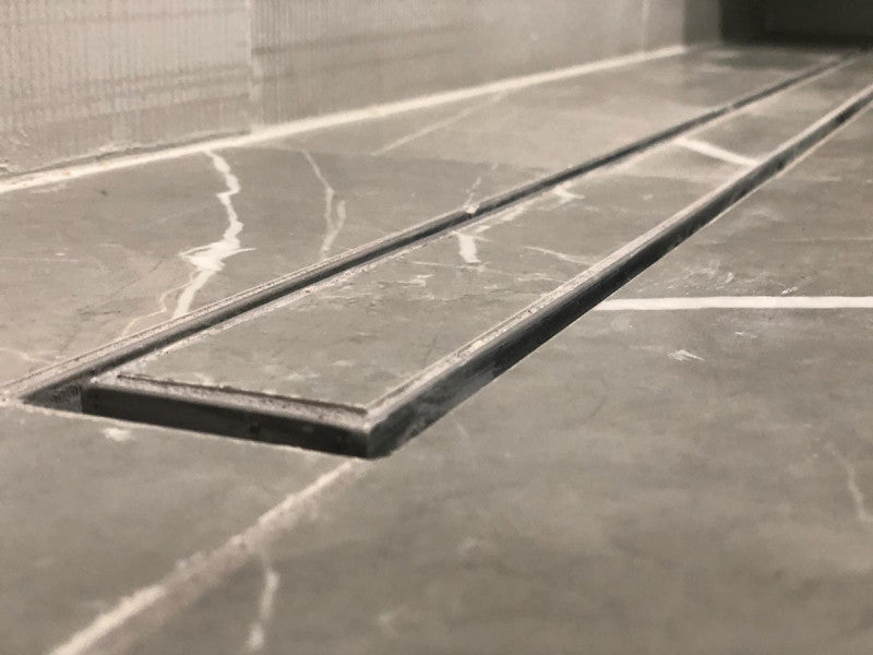 Matte Black Tile Insert Linear Shower Drain with Free Hair Trap by SereneDrains